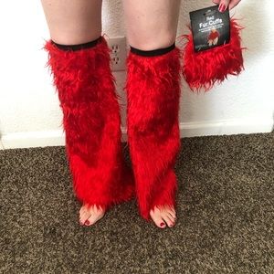 Red faux fur leg warmers and wrist cuffs.